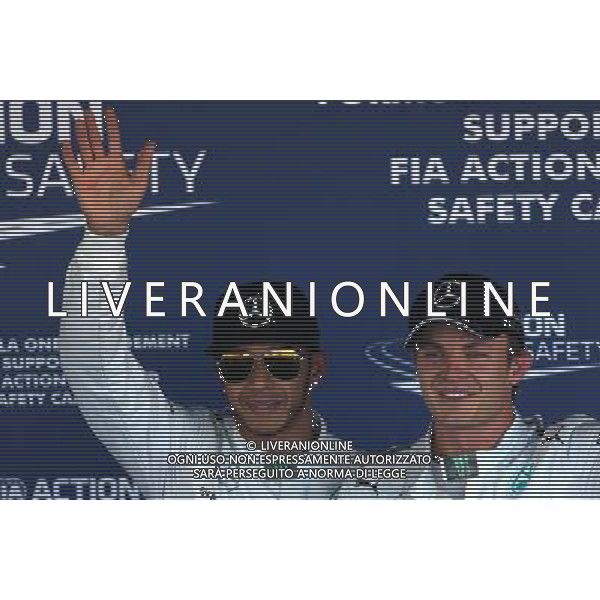 Lewis Hamilton (GBR), Mercedes AMG F1 Team and Nico Rosberg (GER), Mercedes AMG F1 Team 11.10.2014. Formula 1 World Championship, Rd 16, Russian Grand Prix, Sochi Autodrom, Sochi, Russia, Qualifying Day. - www.xpbimages.com, EMail: requests@xpbimages.com - copy of publication required for printed pictures. Every used picture is fee-liable. © Copyright: Charniaux / XPB Images /AGENZIA ALDO LIVERANI SAS - ITALY ONLY - EDITORIAL USE ONLY - Gp F1 Sochi Russia prove ufficiali