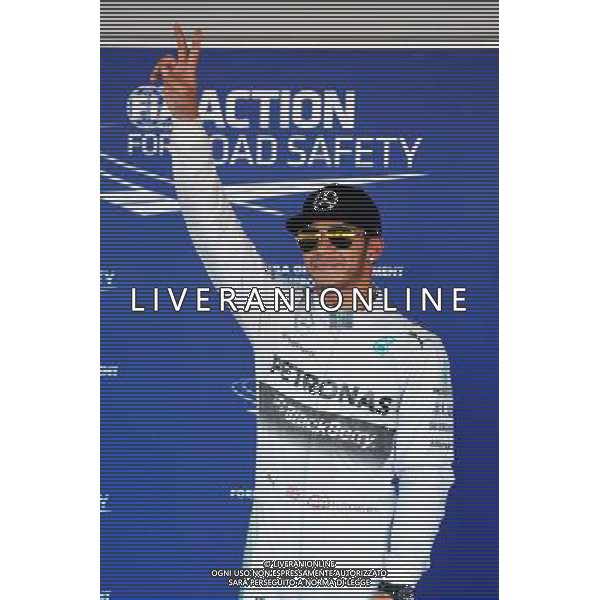 Lewis Hamilton (GBR) Mercedes AMG F1 celebrates his pole position in parc ferme. 11.10.2014. Formula 1 World Championship, Rd 16, Russian Grand Prix, Sochi Autodrom, Sochi, Russia, Qualifying Day. Ag ALDO LIVERANI SAS ONLY ITALY