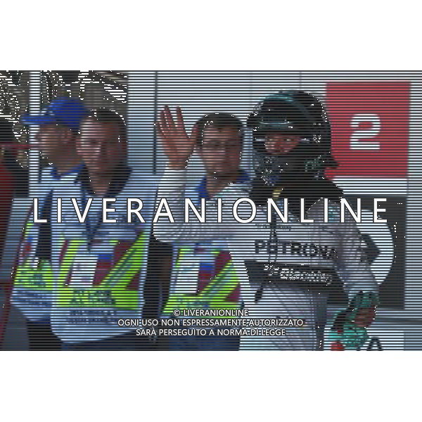 Nico Rosberg (GER) Mercedes AMG F1 celebrates his second position in parc ferme. 11.10.2014. Formula 1 World Championship, Rd 16, Russian Grand Prix, Sochi Autodrom, Sochi, Russia, Qualifying Day. Ag ALDO LIVERANI SAS ONLY ITALY