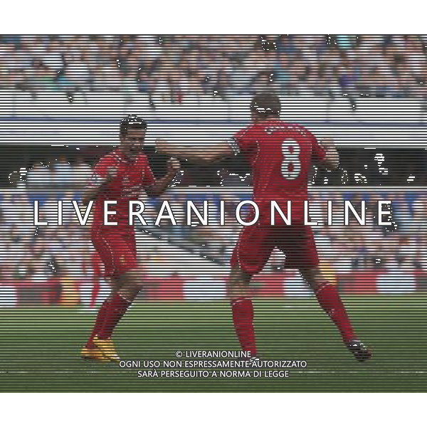 Liverpool\'s Philippe Coutinho celebrates the HIS goal Photographer Kieran Galvin/CameraSport Football - Barclays Premiership - Queens Park Rangers v Liverpool - Sunday 19th October 2014 - Loftus Road - London © CameraSport - 43 Linden Ave. Countesthorpe. Leicester. England. LE8 5PG - Tel: +44 (0) 116 277 4147 - admin@camerasport.com - www.camerasport.com /Agenzia Aldo Liverani sas - ITALY ONLY - EDITORIAL USE ONLY