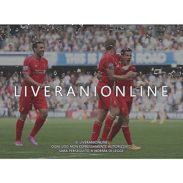 Liverpool\'s Philippe Coutinho celebrates the HIS goal Photographer Kieran Galvin/CameraSport Football - Barclays Premiership - Queens Park Rangers v Liverpool - Sunday 19th October 2014 - Loftus Road - London © CameraSport - 43 Linden Ave. Countesthorpe. Leicester. England. LE8 5PG - Tel: +44 (0) 116 277 4147 - admin@camerasport.com - www.camerasport.com /Agenzia Aldo Liverani sas - ITALY ONLY - EDITORIAL USE ONLY