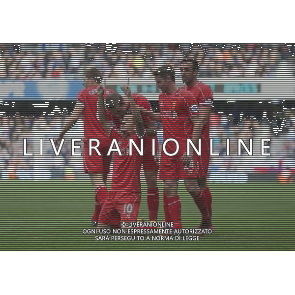Liverpool\'s Philippe Coutinho celebrates the HIS goal Photographer Kieran Galvin/CameraSport Football - Barclays Premiership - Queens Park Rangers v Liverpool - Sunday 19th October 2014 - Loftus Road - London © CameraSport - 43 Linden Ave. Countesthorpe. Leicester. England. LE8 5PG - Tel: +44 (0) 116 277 4147 - admin@camerasport.com - www.camerasport.com /Agenzia Aldo Liverani sas - ITALY ONLY - EDITORIAL USE ONLY