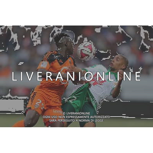 Lamine GASSAMA / Kevin MONNET PAQUET - 18.10.2014 - Lorient / Saint Etienne - 10eme journee de Ligue 1 Photo : Vincent Michel / Icon Sport /Agenzia Aldo Liverani sas - ITALY ONLY - EDITORIAL USE ONLY