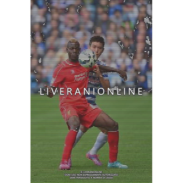 Mario BALOTELLI / Suk Young YUN - 19.10.2014 - Queens Park Rangers / Liverpool - 8eme journee de Premier League Photo : Winterpress / Icon Sport AG ALDO LIVERANI SAS ONLY ITALY