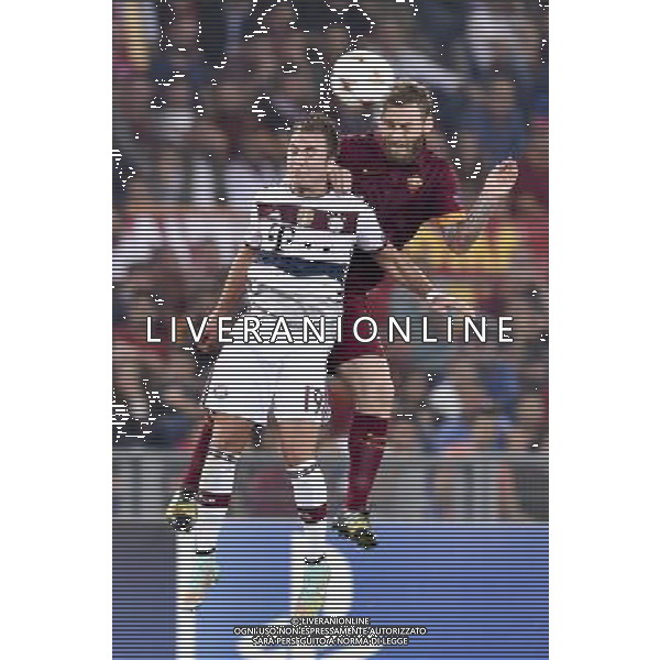 Roma - 21/10/2014 - Stadio Olimpico - Uefa Champions League 2014/2015 - AS Roma vs Bayern Monaco - nella foto: daniele de rossi e gotze / Ph Fabrizio Corradetti - Ag. Aldo Liverani sas