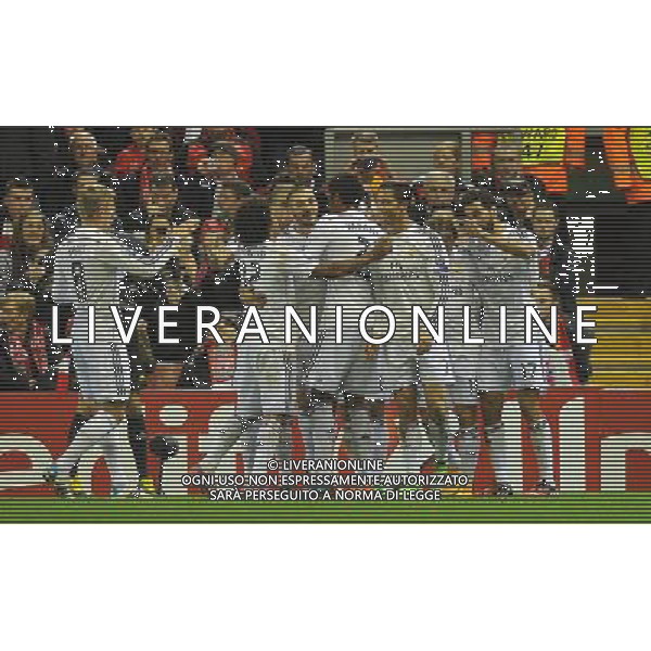 Real Madrid\'s Cristiano Ronaldo is congratulated on scoring his team\'s first goal Photographer Dave Howarth/CameraSport Football - UEFA Champions League Group B - Liverpool v Real Madrid - Wednesday 22nd October 2014 - Anfield - Liverpool © CameraSport - 43 Linden Ave. Countesthorpe. Leicester. England. LE8 5PG - Tel: +44 (0) 116 277 4147 - admin@camerasport.com - www.camerasport.com AG ALDO LIVERANI SAS ONLY ITALY