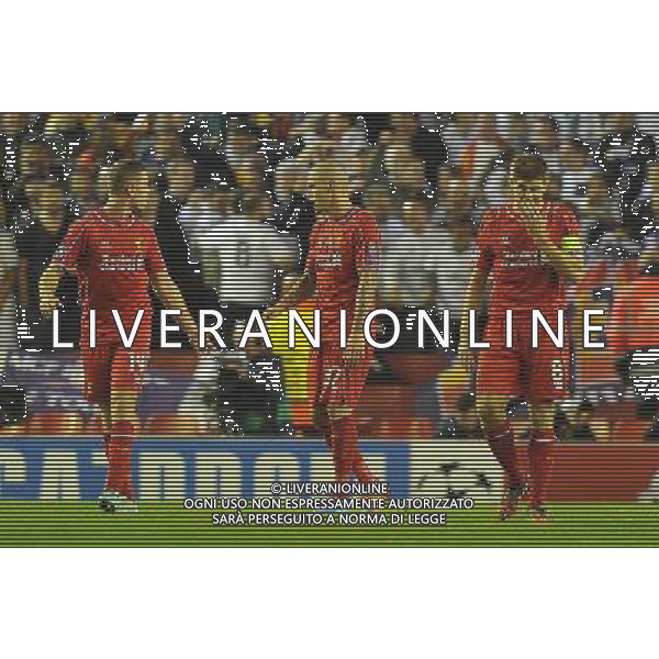 What\'s going wrong think Liverpool\'s Jordan Henderson Martin Skrtel and Steven Gerrard Photographer Dave Howarth/CameraSport Football - UEFA Champions League Group B - Liverpool v Real Madrid - Wednesday 22nd October 2014 - Anfield - Liverpool © CameraSport - 43 Linden Ave. Countesthorpe. Leicester. England. LE8 5PG - Tel: +44 (0) 116 277 4147 - admin@camerasport.com - www.camerasport.com AG ALDO LIVERANI SAS ONLY ITALY