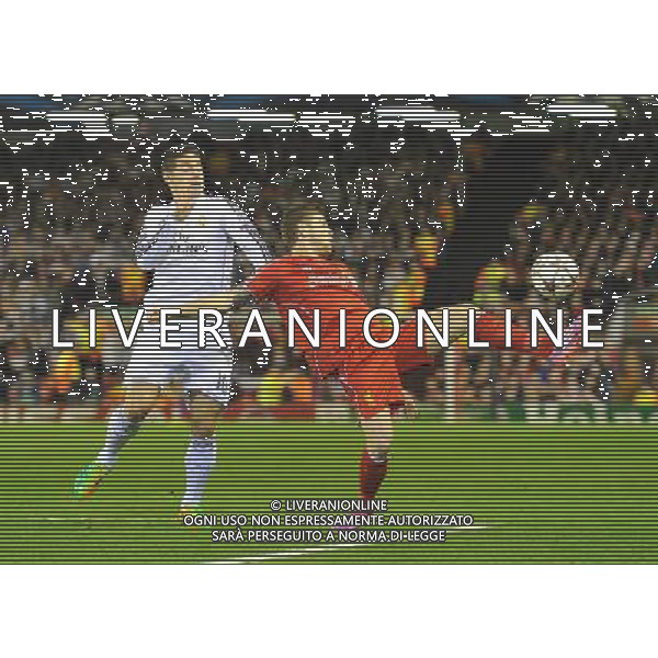 Real Madrid\'s James Rodriguez and Liverpool\'s Alberto Moreno battle for the ball Photographer Dave Howarth/CameraSport Football - UEFA Champions League Group B - Liverpool v Real Madrid - Wednesday 22nd October 2014 - Anfield - Liverpool © CameraSport - 43 Linden Ave. Countesthorpe. Leicester. England. LE8 5PG - Tel: +44 (0) 116 277 4147 - admin@camerasport.com - www.camerasport.com /Agenzia Aldo Liverani sas - ITALY ONLY - EDITORIAL USE ONLY