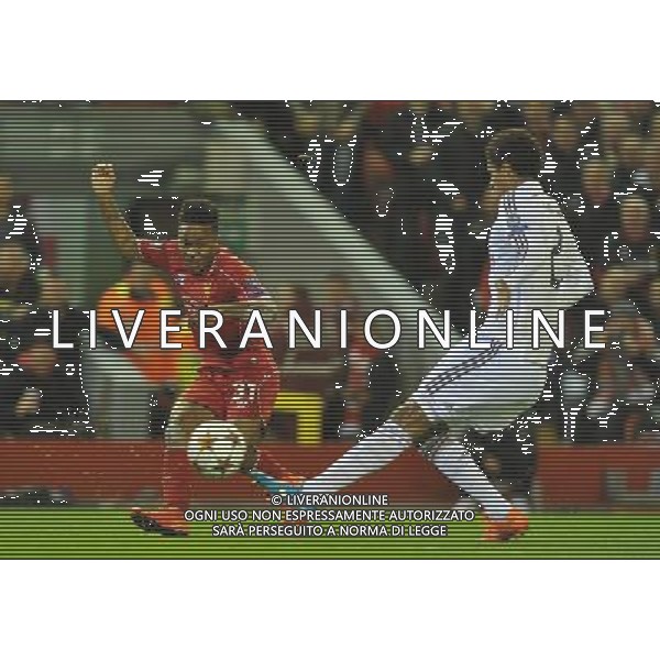 Liverpool\'s Raheem Sterling has his shot deflected Photographer Dave Howarth/CameraSport Football - UEFA Champions League Group B - Liverpool v Real Madrid - Wednesday 22nd October 2014 - Anfield - Liverpool © CameraSport - 43 Linden Ave. Countesthorpe. Leicester. England. LE8 5PG - Tel: +44 (0) 116 277 4147 - admin@camerasport.com - www.camerasport.com /Agenzia Aldo Liverani sas - ITALY ONLY - EDITORIAL USE ONLY