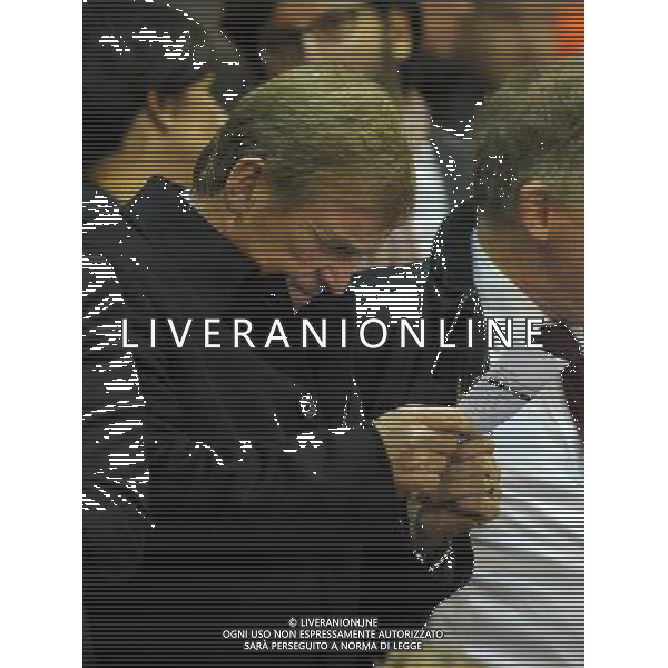 Kenny Dalglish runs his eye over the team list Photographer Dave Howarth/CameraSport Football - UEFA Champions League Group B - Liverpool v Real Madrid - Wednesday 22nd October 2014 - Anfield - Liverpool © CameraSport - 43 Linden Ave. Countesthorpe. Leicester. England. LE8 5PG - Tel: +44 (0) 116 277 4147 - admin@camerasport.com - www.camerasport.com /Agenzia Aldo Liverani sas - ITALY ONLY - EDITORIAL USE ONLY