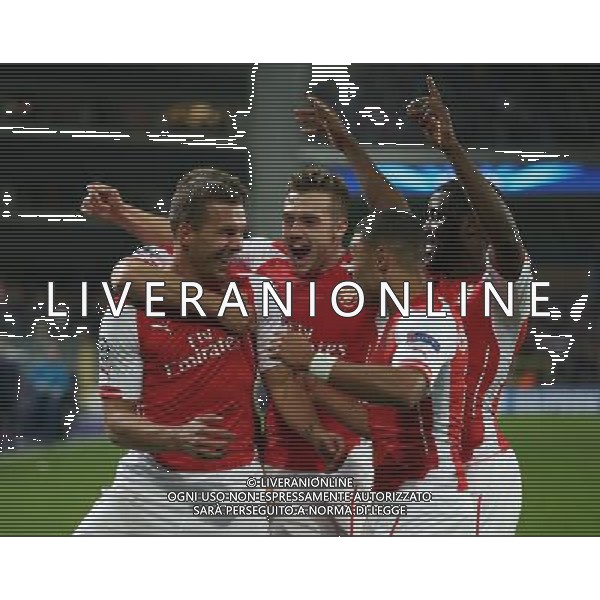 Arsenal\'s Lukas Podolski celebrates his goal Photographer Kieran Galvin/CameraSport Football - UEFA Champions League Group D - Anderlecht v Arsenal - Wednesday 22 October 2014 - Constant Vanden Stockstadion - Brussels - Belgium © CameraSport - 43 Linden Ave. Countesthorpe. Leicester. England. LE8 5PG - Tel: +44 (0) 116 277 4147 - admin@camerasport.com - www.camerasport.com /Agenzia Aldo Liverani sas - ITALY ONLY - EDITORIAL USE ONLY