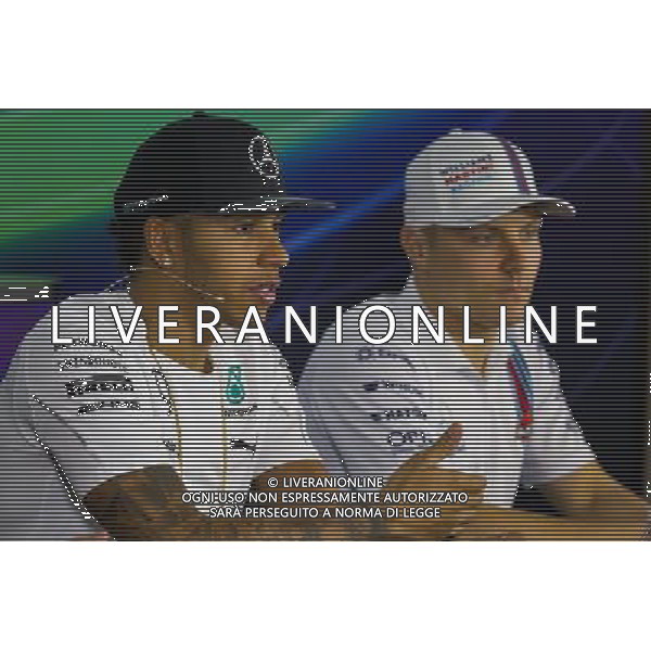(L to R): Lewis Hamilton (GBR) Mercedes AMG F1 and Valtteri Bottas (FIN) Williams in the FIA Press Conference. 30.10.2014. Formula 1 World Championship, Rd 17, United States Grand Prix, Austin, Texas, USA, Preparation Day. AG ALDO LIVERANI SAS ONLY ITALY