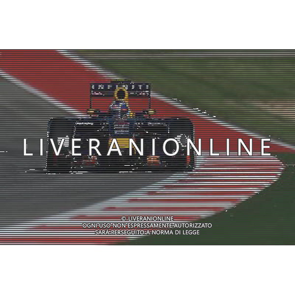 Daniel Ricciardo (AUS) Red Bull Racing RB10. 31.10.2014. Formula 1 World Championship, Rd 17, United States Grand Prix, Austin, Texas, USA, Practice Day. - www.xpbimages.com, EMail: requests@xpbimages.com - copy of publication required for printed pictures. Every used picture is fee-liable. © Copyright: Price / XPB Images /Agenzia Aldo Liverani sas - ITALY ONLY - EDITORIAL USE ONLY
