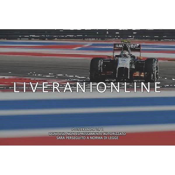 Sergio Perez (MEX) Sahara Force India F1 VJM07. 31.10.2014. Formula 1 World Championship, Rd 17, United States Grand Prix, Austin, Texas, USA, Practice Day. - www.xpbimages.com, EMail: requests@xpbimages.com - copy of publication required for printed pictures. Every used picture is fee-liable. © Copyright: Price / XPB Images /Agenzia Aldo Liverani sas - ITALY ONLY - EDITORIAL USE ONLY