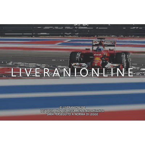 Fernando Alonso (ESP) Ferrari F14-T. 31.10.2014. Formula 1 World Championship, Rd 17, United States Grand Prix, Austin, Texas, USA, Practice Day. - www.xpbimages.com, EMail: requests@xpbimages.com - copy of publication required for printed pictures. Every used picture is fee-liable. © Copyright: Price / XPB Images /Agenzia Aldo Liverani sas - ITALY ONLY - EDITORIAL USE ONLY
