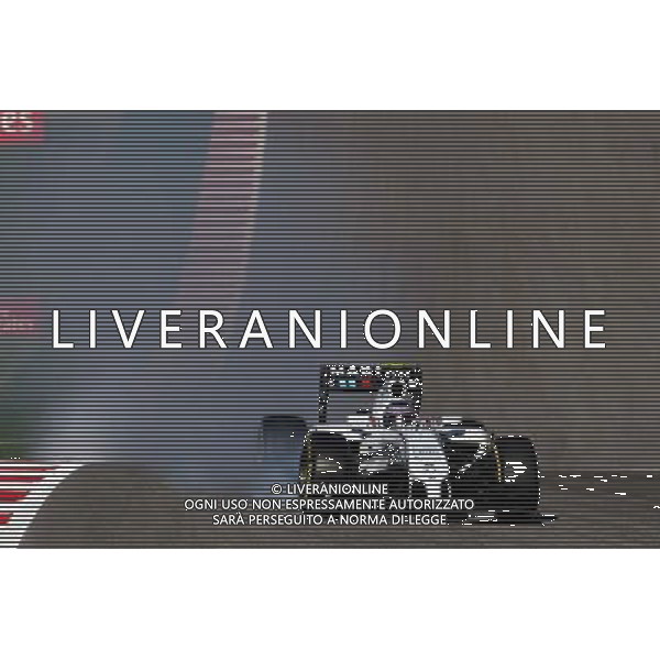 Valtteri Bottas (FIN) Williams FW36 locks up under braking. 01.11.2014. Formula 1 World Championship, Rd 17, United States Grand Prix, Austin, Texas, USA, Qualifying Day. AG ALDO LIVERANI SAS INLY ITALY