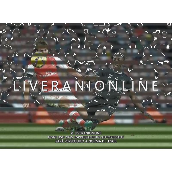 Burnley\'s Marvin Sordell battles with Arsenal\'s Mathieu Flamini Photographer Ian Cook/CameraSport Football - Barclays Premiership - Arsenal v Burnley - Saturday 1st November 2014 - Emirates Stadium - London © CameraSport - 43 Linden Ave. Countesthorpe. Leicester. England. LE8 5PG - Tel: +44 (0) 116 277 4147 - admin@camerasport.com - www.camerasport.com AG ALDO LIVERANI SAS ONLY ITALY