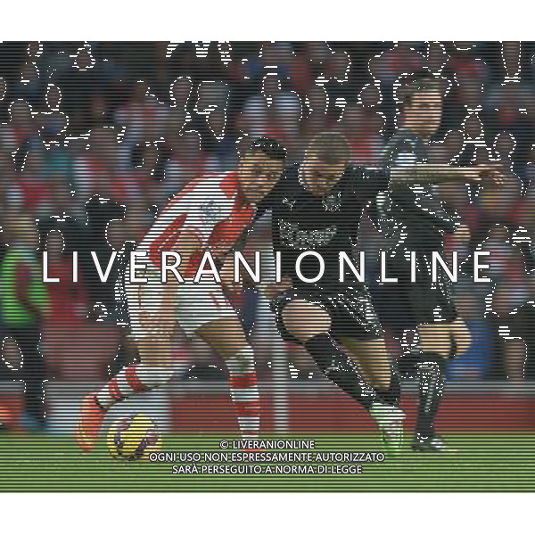 Burnley\'s Kieran Trippier battles with Arsenal\'s Alexis S‡nchez Photographer Ian Cook/CameraSport Football - Barclays Premiership - Arsenal v Burnley - Saturday 1st November 2014 - Emirates Stadium - London © CameraSport - 43 Linden Ave. Countesthorpe. Leicester. England. LE8 5PG - Tel: +44 (0) 116 277 4147 - admin@camerasport.com - www.camerasport.com AG ALDO LIVERANI SAS ONLY ITALY
