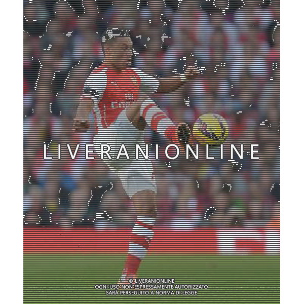 Arsenal\'s Alex Oxlade-Chamberlain in action during todays match Photographer Ian Cook/CameraSport Football - Barclays Premiership - Arsenal v Burnley - Saturday 1st November 2014 - Emirates Stadium - London © CameraSport - 43 Linden Ave. Countesthorpe. Leicester. England. LE8 5PG - Tel: +44 (0) 116 277 4147 - admin@camerasport.com - www.camerasport.com AG ALDO LIVERANI SAS ONLY ITALY