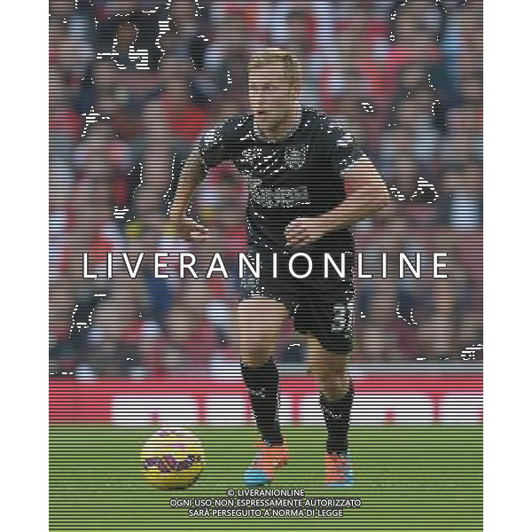 Burnley\'s Scott Arfield in action during todays match Photographer Ian Cook/CameraSport Football - Barclays Premiership - Arsenal v Burnley - Saturday 1st November 2014 - Emirates Stadium - London © CameraSport - 43 Linden Ave. Countesthorpe. Leicester. England. LE8 5PG - Tel: +44 (0) 116 277 4147 - admin@camerasport.com - www.camerasport.com AG ALDO LIVERANI SAS ONLY ITALY