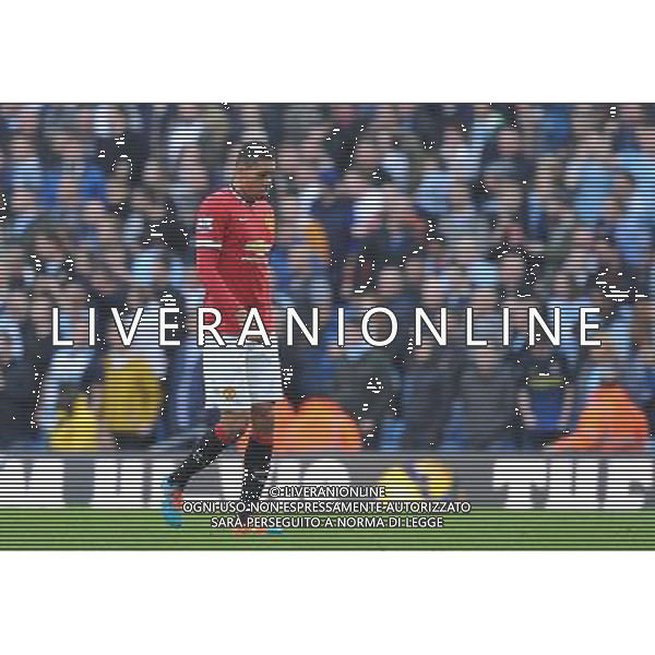 Manchester United\'s Chris Smalling \eaves the pitch after being red carded looking dejected Photographer Dave Howarth/CameraSport Football - Barclays Premiership - Manchester City v Manchester United - Sunday 2nd November 2014 - Etihad Stdium - Manchester © CameraSport - 43 Linden Ave. Countesthorpe. Leicester. England. LE8 5PG - Tel: +44 (0) 116 277 4147 - admin@camerasport.com - www.camerasport.com AG ALDO LIVERANI SAS ONLY ITALY