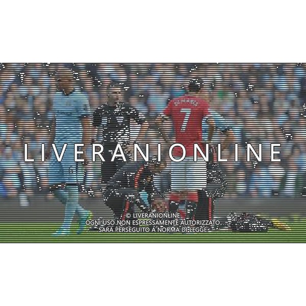 Manchester United\'s Marcos Rojo lays with a shoulder injury Photographer Dave Howarth/CameraSport Football - Barclays Premiership - Manchester City v Manchester United - Sunday 2nd November 2014 - Etihad Stdium - Manchester © CameraSport - 43 Linden Ave. Countesthorpe. Leicester. England. LE8 5PG - Tel: +44 (0) 116 277 4147 - admin@camerasport.com - www.camerasport.com AG ALDO LIVERANI SAS ONLY ITALY