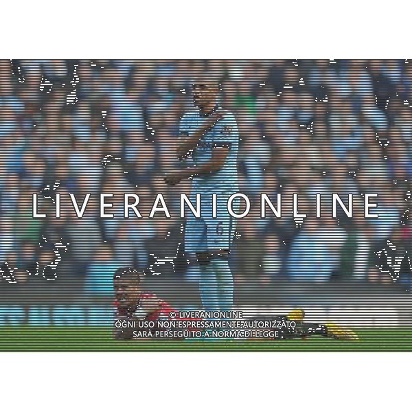 Manchester United\'s Marcos Rojo lays with a shoulder injury after colliding with Manchester City\'s Fernando Photographer Dave Howarth/CameraSport Football - Barclays Premiership - Manchester City v Manchester United - Sunday 2nd November 2014 - Etihad Stdium - Manchester © CameraSport - 43 Linden Ave. Countesthorpe. Leicester. England. LE8 5PG - Tel: +44 (0) 116 277 4147 - admin@camerasport.com - www.camerasport.com AG ALDO LIVERANI SAS ONLY ITALY