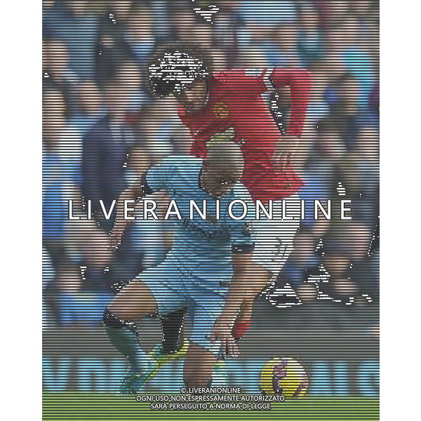 Manchester United\'s Marouane Fellaini and Manchester City\'s Fernando battle for the ball Photographer Dave Howarth/CameraSport Football - Barclays Premiership - Manchester City v Manchester United - Sunday 2nd November 2014 - Etihad Stdium - Manchester © CameraSport - 43 Linden Ave. Countesthorpe. Leicester. England. LE8 5PG - Tel: +44 (0) 116 277 4147 - admin@camerasport.com - www.camerasport.com AG ALDO LIVERANI SAS ONLY ITALY