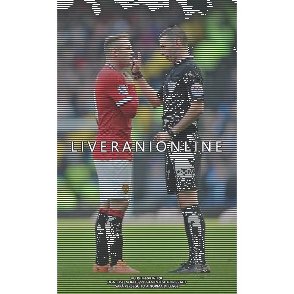 Referee Michael Oliver and Manchester United\'s Wayne Rooney have words Photographer Dave Howarth/CameraSport Football - Barclays Premiership - Manchester City v Manchester United - Sunday 2nd November 2014 - Etihad Stdium - Manchester © CameraSport - 43 Linden Ave. Countesthorpe. Leicester. England. LE8 5PG - Tel: +44 (0) 116 277 4147 - admin@camerasport.com - www.camerasport.com AG ALDO LIVERANI SAS ONLY ITALY