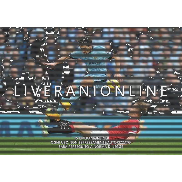 Manchester City\'s Jesœs Navas is tackled by Manchester United\'s Luke Shaw Photographer Dave Howarth/CameraSport Football - Barclays Premiership - Manchester City v Manchester United - Sunday 2nd November 2014 - Etihad Stdium - Manchester © CameraSport - 43 Linden Ave. Countesthorpe. Leicester. England. LE8 5PG - Tel: +44 (0) 116 277 4147 - admin@camerasport.com - www.camerasport.com AG ALDO LIVERANI SAS ONLY ITALY