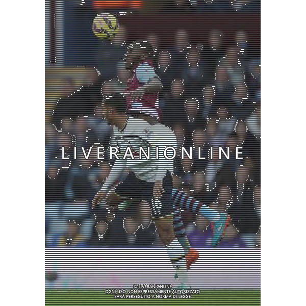 Aston Villa\'s Christian Benteke under pressure from Tottenham Hotspur\'s Kyle Naughton Photographer Kieran Galvin/CameraSport Football - Barclays Premiership - Aston Villa v Tottenham Hotspur - Sunday 2nd November 2014 - Villa Park - Birmingham © CameraSport - 43 Linden Ave. Countesthorpe. Leicester. England. LE8 5PG - Tel: +44 (0) 116 277 4147 - admin@camerasport.com - www.camerasport.com AG ALDO LIVERANI SAS ONLY ITALY