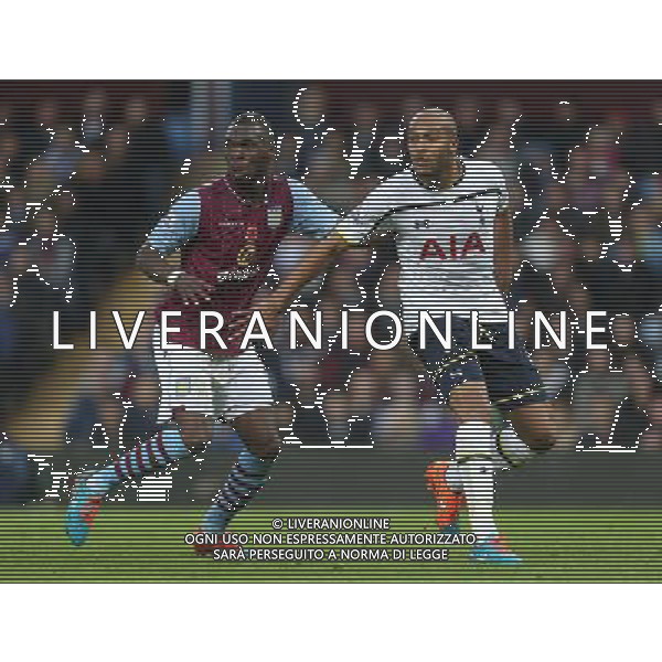 Tottenham Hotspur\'s Younes Kaboul holds off Aston Villa\'s Christian Benteke Photographer Kieran Galvin/CameraSport Football - Barclays Premiership - Aston Villa v Tottenham Hotspur - Sunday 2nd November 2014 - Villa Park - Birmingham © CameraSport - 43 Linden Ave. Countesthorpe. Leicester. England. LE8 5PG - Tel: +44 (0) 116 277 4147 - admin@camerasport.com - www.camerasport.com AG ALDO LIVERANI SAS ONLY ITALY