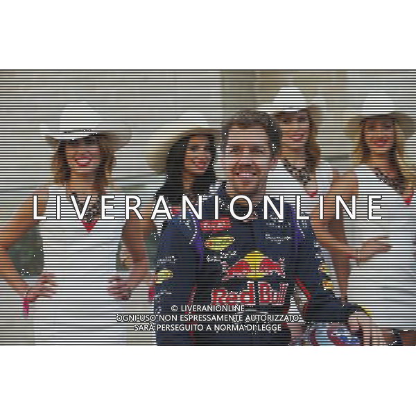 Sebastian Vettel (GER) Red Bull Racing with the grid girls. 02.11.2014. Formula 1 World Championship, Rd 17, United States Grand Prix, Austin, Texas, USA, Race Day. AG ALDO LIVERANI SAS ONLY ITALY