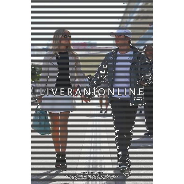 Nico Rosberg (GER) Mercedes AMG F1 with his wife Vivian Rosberg (GER). 02.11.2014. Formula 1 World Championship, Rd 17, United States Grand Prix, Austin, Texas, USA, Race Day. AG ALDO LIVERANI SAS ONLY ITALY