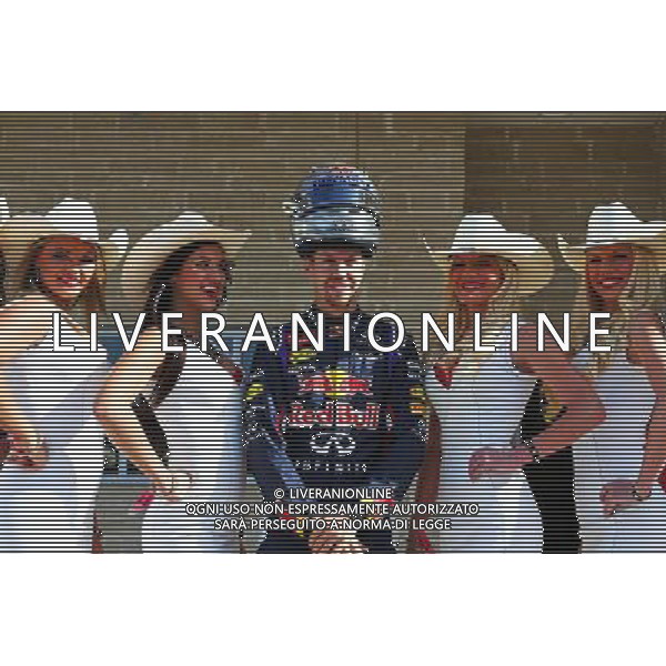 Sebastian Vettel (GER) Red Bull Racing with the grid girls. 02.11.2014. Formula 1 World Championship, Rd 17, United States Grand Prix, Austin, Texas, USA, Race Day. AG ALDO LIVERANI SAS ONLY ITALY
