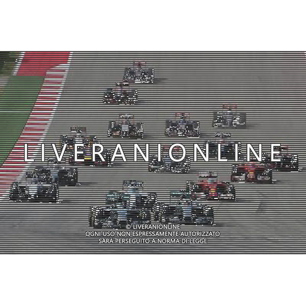 Nico Rosberg (GER) Mercedes AMG F1 W05 leads at the start of the race. 02.11.2014. Formula 1 World Championship, Rd 17, United States Grand Prix, Austin, Texas, USA, Race Day. AG ALDO LIVERANI SAS ONLY ITALY