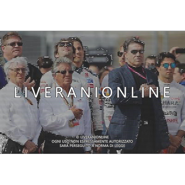 (L to R): Bernie Ecclestone (GBR) with Mario Andretti (USA) Circuit of The Americas\' Official Ambassador on the grid. 02.11.2014. Formula 1 World Championship, Rd 17, United States Grand Prix, Austin, Texas, USA, Race Day. AG ALDO LIVERANI SAS ONLY ITALY
