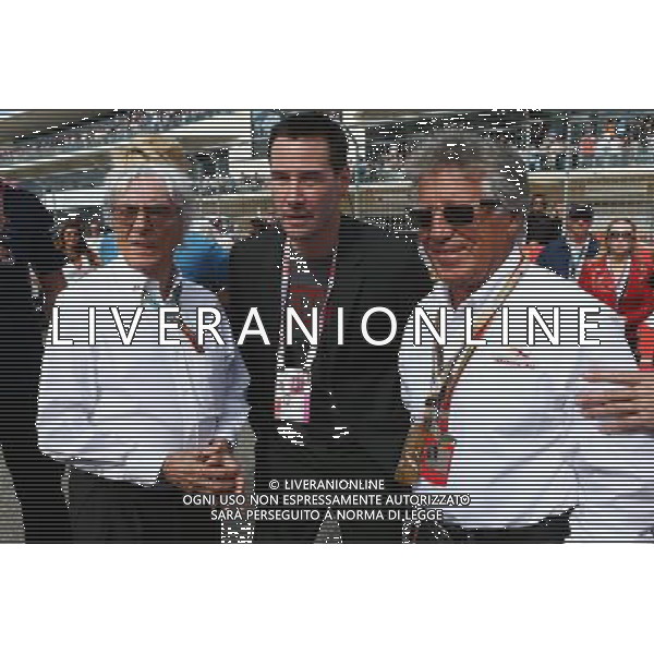 (L to R): Bernie Ecclestone (GBR) with Keanu Reeves (USA) Actor and Mario Andretti (USA) Circuit of The Americas\' Official Ambassador on the grid. 02.11.2014. Formula 1 World Championship, Rd 17, United States Grand Prix, Austin, Texas, USA, Race Day. AG ALDO LIVERANI SAS ONLY ITALY