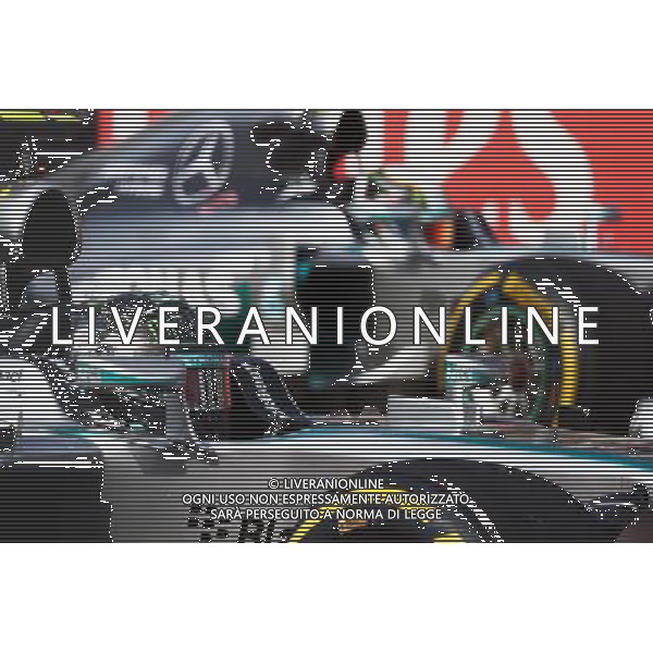 Nico Rosberg (GER) Mercedes AMG F1 W05 and team mate on the grid at the start of the race. 02.11.2014. Formula 1 World Championship, Rd 17, United States Grand Prix, Austin, Texas, USA, Race Day. /AGENZIA ALDO LIVERANI SAS - ITALY ONLY - EDITORIAL USE ONLY