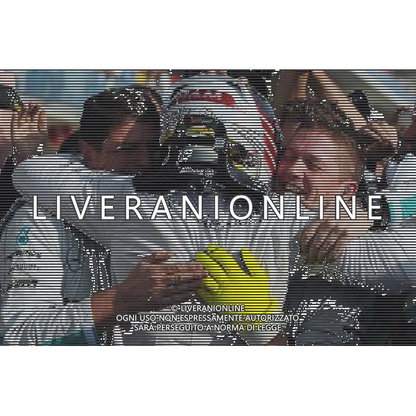 Race winner Lewis Hamilton (GBR) Mercedes AMG F1 celebrates with the team in parc ferme. 02.11.2014. Formula 1 World Championship, Rd 17, United States Grand Prix, Austin, Texas, USA, Race Day. AG ALDO LIVERANI SAS ONLY ITALY