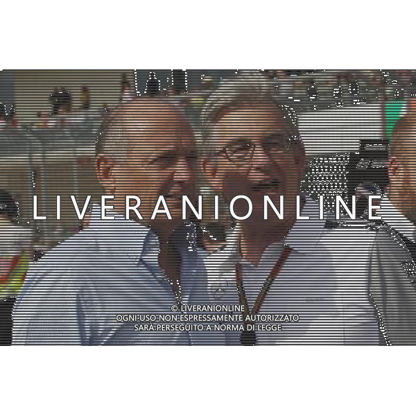 (L to R): Ron Dennis (GBR) McLaren Executive Chairman with Ekrem Sami (IRN) Mclaren Head of Marketing on the grid. 02.11.2014. Formula 1 World Championship, Rd 17, United States Grand Prix, Austin, Texas, USA, Race Day. AG ALDO LIVERANI SAS ONLY ITALY