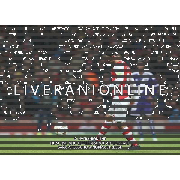 Arsenal\'s Mikel Arteta scores from penalty spot Photographer Kieran Galvin/CameraSport Football - UEFA Champions League Group D - Arsenal v Anderlecht - Tuesday 4th November 2014 - Emirates Stadium - London © CameraSport - 43 Linden Ave. Countesthorpe. Leicester. England. LE8 5PG - Tel: +44 (0) 116 277 4147 - admin@camerasport.com - www.camerasport.com /Agenzia Aldo Liverani sas - ITALY ONLY - EDITORIAL USE ONLY