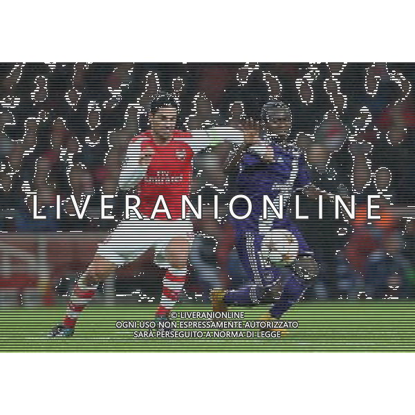 Anderlecht\'s Frank Acheampong under pressure from Arsenal\'s Mikel Arteta Photographer Kieran Galvin/CameraSport Football - UEFA Champions League Group D - Arsenal v Anderlecht - Tuesday 4th November 2014 - Emirates Stadium - London © CameraSport - 43 Linden Ave. Countesthorpe. Leicester. England. LE8 5PG - Tel: +44 (0) 116 277 4147 - admin@camerasport.com - www.camerasport.com /Agenzia Aldo Liverani sas - ITALY ONLY - EDITORIAL USE ONLY