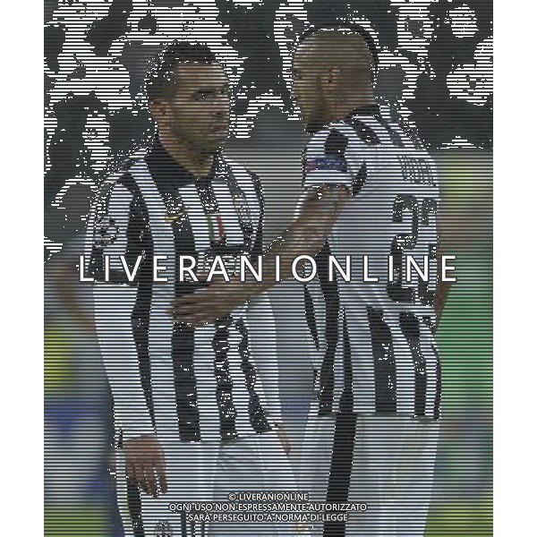 UEFA Champions League 2014/2015 Gruppo A Torino - 04.11.2014 Juventus-Olympiacos Nella Foto:Tevez Carlos-Vidal Arturo /Ph.Vitez-Ag. Aldo Liverani