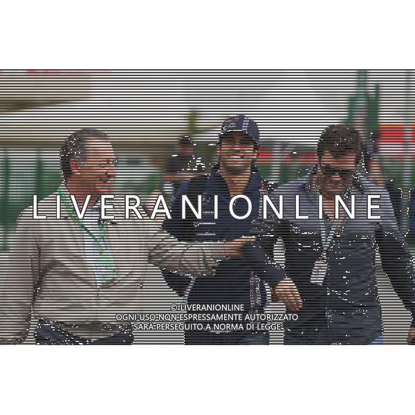 Felipe Nasr (BRA) Williams Test and Reserve Driver (Centre) with Steve Robertson (GBR) Driver Manager (Right). 06.11.2014. Formula 1 World Championship, Rd 18, Brazilian Grand Prix, Sao Paulo, Brazil, Preparation Day. AG ALDOL IVERANI SAS ONLY ITALY
