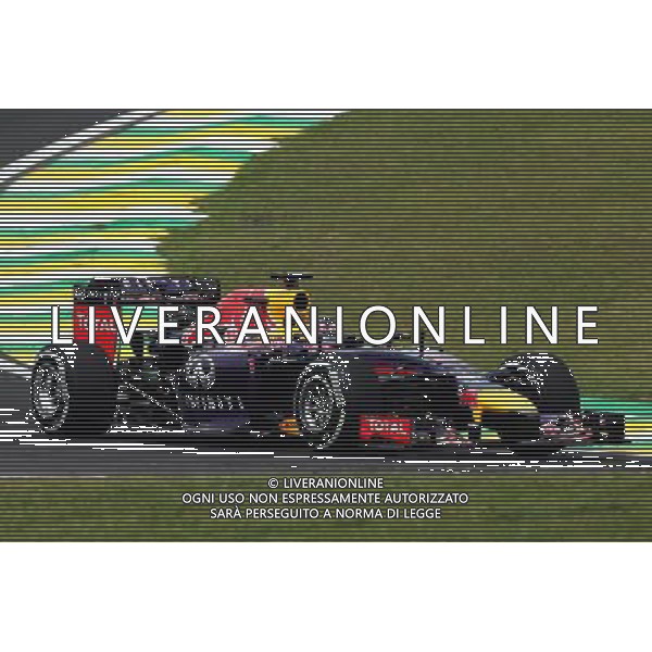 Sebastian Vettel (GER) Red Bull Racing RB10. 07.11.2014. Formula 1 World Championship, Rd 18, Brazilian Grand Prix, Sao Paulo, Brazil, Practice Day. - www.xpbimages.com, EMail: requests@xpbimages.com - copy of publication required for printed pictures. Every used picture is fee-liable. © Copyright: Moy / XPB Images /AGENZIA ALDO LIVERANI SAS - ITALY ONLY - EDITORIAL USE ONLY