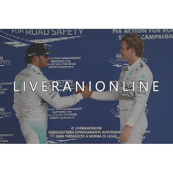 Lewis Hamilton (GBR) Mercedes AMG F1 W05 and Nico Rosberg (GER) Mercedes AMG F1 W05. 08.11.2014. Formula 1 World Championship, Rd 18, Brazilian Grand Prix, Sao Paulo, Brazil, Qualifying Day. - www.xpbimages.com, EMail: requests@xpbimages.com - copy of publication required for printed pictures. Every used picture is fee-liable. © Copyright: Batchelor / XPB Images /AGENZIA ALDO LIVERANI SAS - ITALY ONLY - EDITORIAL USE ONLY - Grand Prix Gp F1 Brasile prove ufficiali