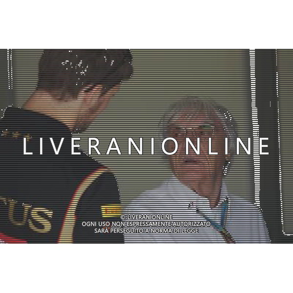 (L to R): Romain Grosjean (FRA) Lotus F1 Team with Bernie Ecclestone (GBR). 09.11.2014. Formula 1 World Championship, Rd 18, Brazilian Grand Prix, Sao Paulo, Brazil, Race Day. - www.xpbimages.com, EMail: requests@xpbimages.com - copy of publication required for printed pictures. Every used picture is fee-liable. © Copyright: Photo4 / XPB Images /AGENZIA ALDO LIVERANI SAS - ITALY ONLY - EDITORIAL USE ONLY - Grand Prix Gp F1 Brasile gara