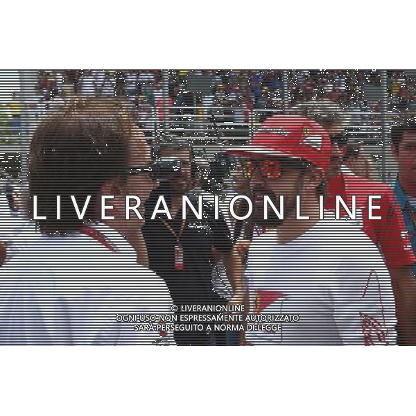 (L to R): Emerson Fittipaldi (BRA) with Fernando Alonso (ESP) Ferrari on the grid. 09.11.2014. Formula 1 World Championship, Rd 18, Brazilian Grand Prix, Sao Paulo, Brazil, Race Day. - www.xpbimages.com, EMail: requests@xpbimages.com - copy of publication required for printed pictures. Every used picture is fee-liable. © Copyright: Batchelor / XPB Images /AGENZIA ALDO LIVERANI SAS - ITALY ONLY - EDITORIAL USE ONLY - Grand Prix Gp F1 Brasile gara