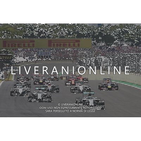 Nico Rosberg (GER) Mercedes AMG F1 W05 leads at the start of the race. 09.11.2014. Formula 1 World Championship, Rd 18, Brazilian Grand Prix, Sao Paulo, Brazil, Race Day. - www.xpbimages.com, EMail: requests@xpbimages.com - copy of publication required for printed pictures. Every used picture is fee-liable. © Copyright: Charniaux / XPB Images /AGENZIA ALDO LIVERANI SAS - ITALY ONLY - EDITORIAL USE ONLY - Grand Prix Gp F1 Brasile gara
